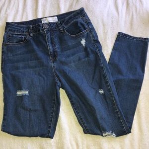Distressed blue jeans